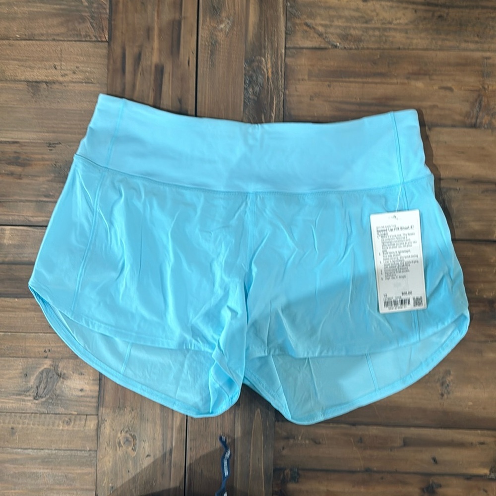 Lululemon Speed Up HR short lined size 12. Cyan/kyak blue